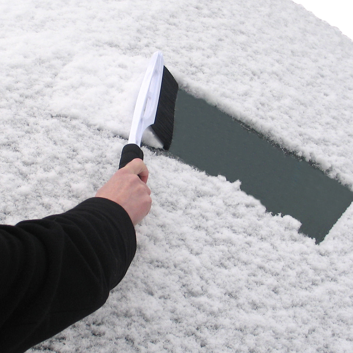 Ice scraper with hand broom