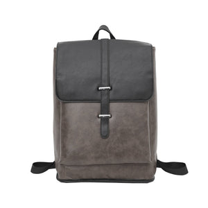 Grauer Lederrucksack mit silbernen Details von vorne