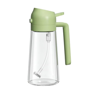 Transparente Ölsprühflasche mit grünem Deckel
