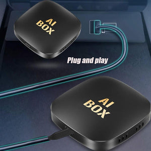 Schwarzer Wireless Carplay-Adapter mit "AI Box" Aufschrift und kleiner Anleitung