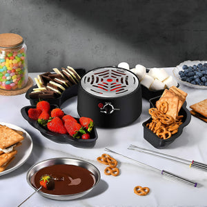 Elektrischer Tischgrill in einem anderen Anwendungsbeispiel mit Marshmallows, Beeren, Schokolade und Bretzeln