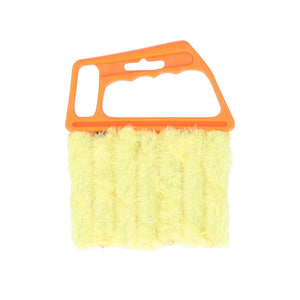 Gelbe Reinigungsbürste mit orangenem Griff