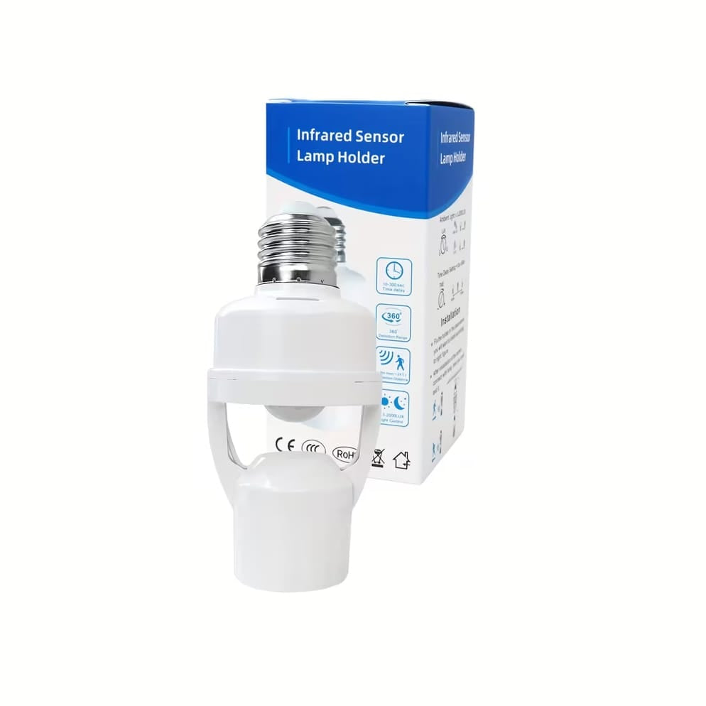 Weisse Lampe mit Bewegungsmelder neben Kartonverpackung