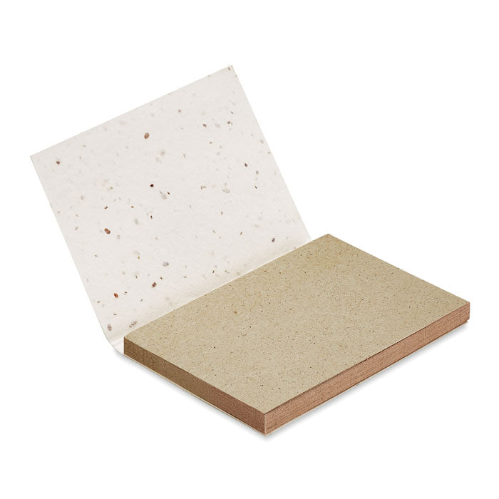 Carnet de notes avec graines de fleurs