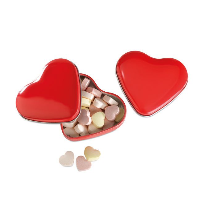 Boîte en forme de cœur avec des bonbons