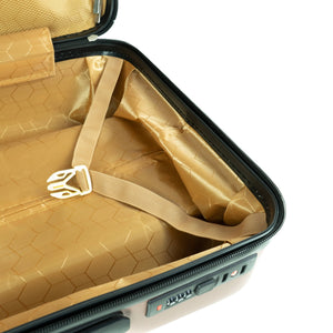 Aufgeklappter Reisekoffer mit goldenem Innenstoff