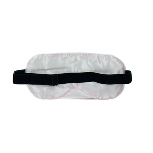 Weisse Schlafmaske mit schwarzem Gummiband von hinten