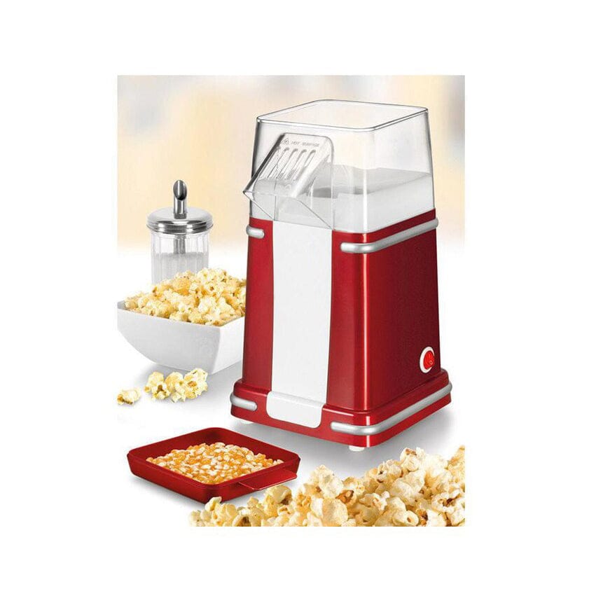 Rot-weisser Popcorn Maker mit silbernen Details mit fertigem Popcorn in einer weissen Schüssel