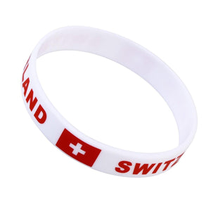 Weisses Silikonarmband mit roter "Switzerland" Aufschrift und schweizer Flagge