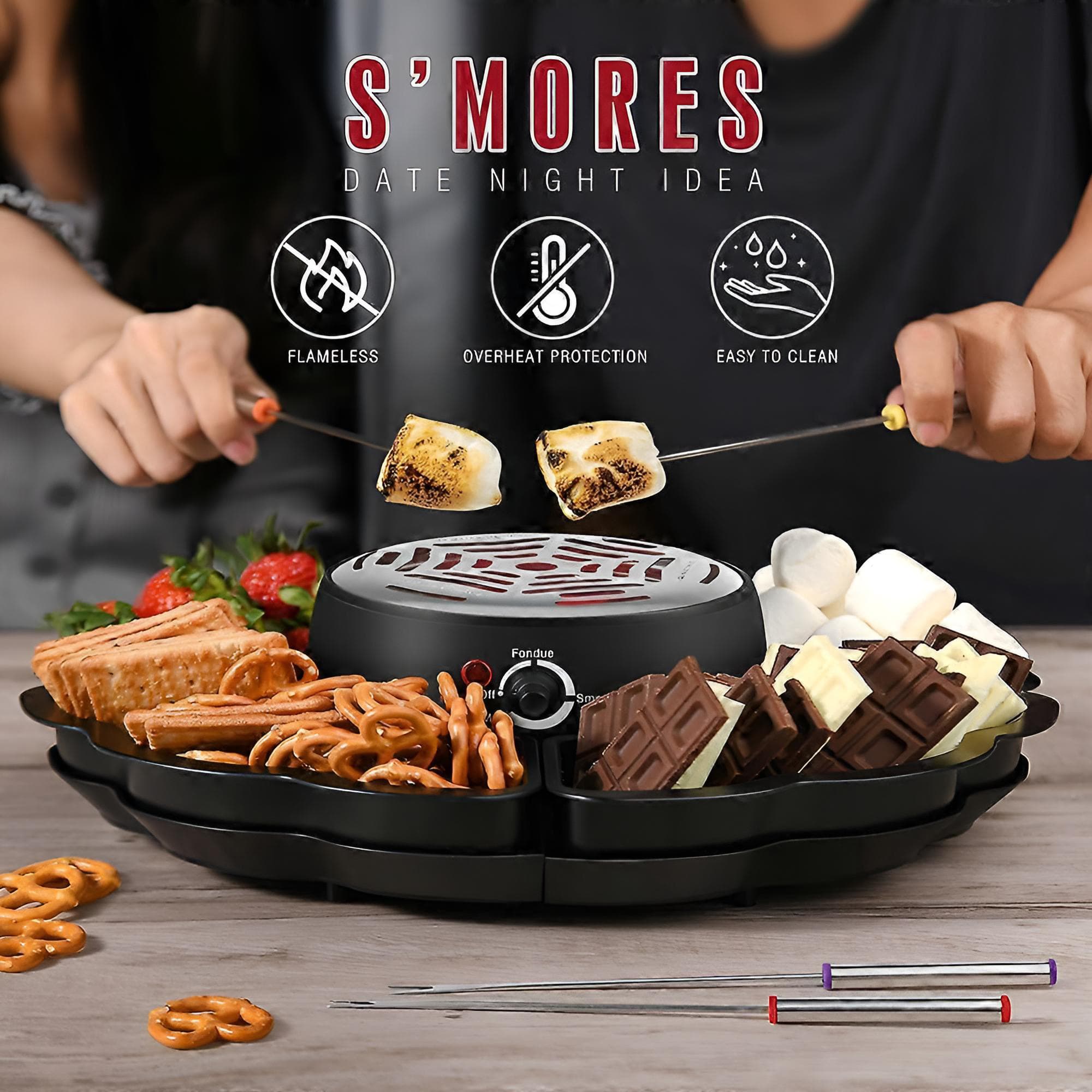 Elektrischer Tischgrill in einem Anwendungsbeispiel mit Marshmallows, Beeren, Schokolade, Bretzeln und Produktdetails