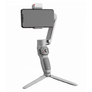 Graues, einklappbares Handystativ und Selfiestick von der Seite