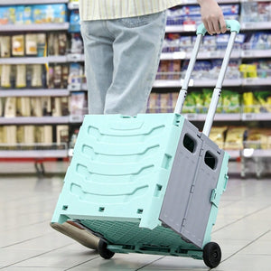 Türkiser, faltbarer Einkaufstrolley in einem Anwendungsbeispiel in einem Supermarkt