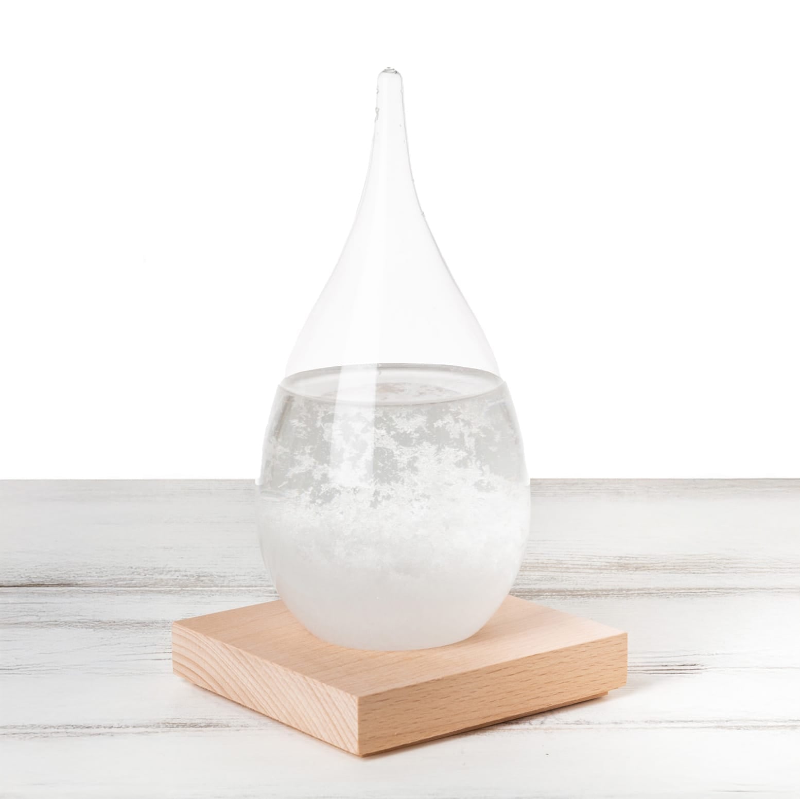 Sturmglas in Form eines Wassertropfens mit Holzständer