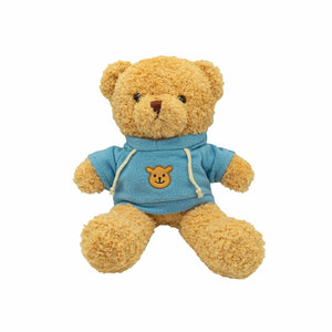 Beiger Teddybär mit blauem Pullover