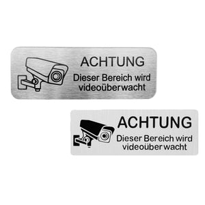Zwei Metall Videoüberwachungsschilder mit schwarzer Schrift