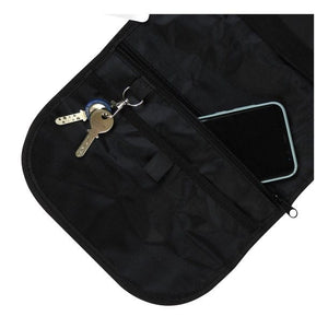 Schwarze Trockentasche von innen mit Schlüsselhalter und Handyfach