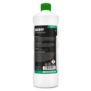 Schmierseife in weißer Flasche mit grünem Deckel von hinten