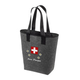 Graue Stofftasche mit schwarzen Henkeln und Schweizerwappen Design